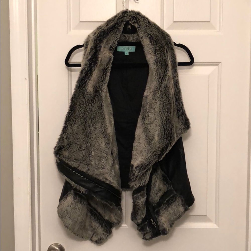 Black and gray fur and leather vest